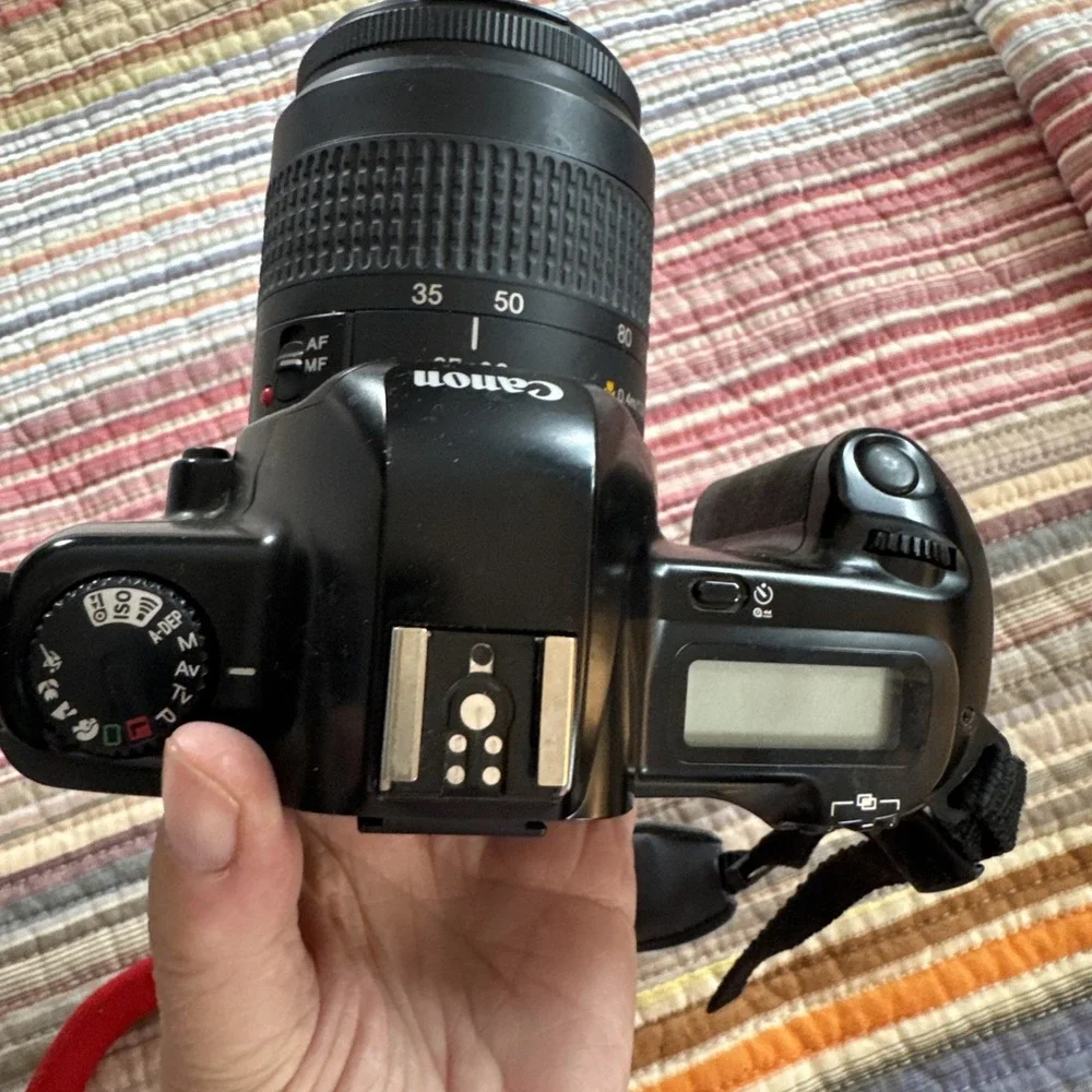 Canon EOS Rebel X 35mm SLR 35-80mm Lens Neck strap Lense Cover Not Tested READ